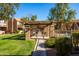 The fenced in community pool is easy to access via a sidewalk for residents of this apartment complex at 8260 E Arabian Trl # 170, Scottsdale, AZ 85258