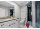 Bathroom featuring glass enclosed shower and modern fixtures at 8307 E Montebello Ave, Scottsdale, AZ 85250