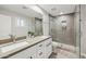 Bathroom with dual sinks, and shower with gray subway tile at 8307 E Montebello Ave, Scottsdale, AZ 85250