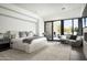 This main bedroom features soft carpet, a seating area, and access to the outdoors at 8822 E Chino Dr, Scottsdale, AZ 85255