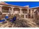 Condo courtyard featuring multiple floors and exterior staircases with a sitting area at 9151 W Greenway Rd # 277, Peoria, AZ 85381