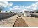 View of the concrete slab and block wall fence at 9156 W Garfield St, Tolleson, AZ 85353