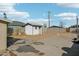 Backyard featuring a utility shed and slab at 9156 W Garfield St, Tolleson, AZ 85353