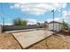 Backyard featuring a block wall fence and slab at 9156 W Garfield St, Tolleson, AZ 85353