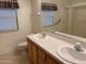 Bathroom featuring a double sink vanity with a white countertop and a shower at 970 W Diamond Rim Dr, Casa Grande, AZ 85122