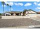 Charming home featuring a desert landscape, covered patio, and an attached two-car garage at 1056 S 79Th St, Mesa, AZ 85208