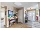 Inviting foyer with tiled floors, ample lighting, and decorative accents creating a warm welcome at 1056 S 79Th St, Mesa, AZ 85208