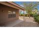 Landscaped backyard featuring patio and trees at 1148 S Sierra St, Gilbert, AZ 85296