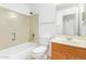 Full bathroom featuring a vanity, toilet, and shower-tub combo at 1148 S Sierra St, Gilbert, AZ 85296