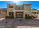 Charming two-story home with a welcoming front porch and desert landscaping at 12132 W Ashby Dr, Peoria, AZ 85383