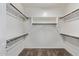 An empty walk-in closet is ready to be customized with plenty of space at 12132 W Ashby Dr, Peoria, AZ 85383