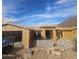 Exterior view of a home under construction featuring wood framing and a blue sky backdrop at 12946 N 116 St # 24, Scottsdale, AZ 85259