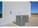 Exterior shot features two modern air conditioning units near the side of the home at 1510 E Red Range Way, Phoenix, AZ 85085