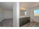 Bathroom featuring a vanity, toilet, and window with a view of the mountains at 1510 E Red Range Way, Phoenix, AZ 85085