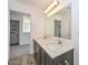 Bathroom featuring double sinks, a large mirror and modern fixtures at 1510 E Red Range Way, Phoenix, AZ 85085