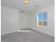 Well-lit bedroom featuring carpet and a window with mountain views at 1510 E Red Range Way, Phoenix, AZ 85085