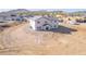 Aerial view showcasing the home's back exterior, emphasizing its desert setting at 1510 E Red Range Way, Phoenix, AZ 85085