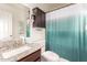 Bathroom featuring a granite countertop, white and green shower curtain, and tiled floors at 1549 W Peralta Ave, Mesa, AZ 85202