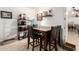 Dining area features tile floors, seating for four, and plenty of counter space at 1549 W Peralta Ave, Mesa, AZ 85202