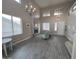 Bright and airy living space featuring high ceilings, lots of windows, and stylish furniture at 17420 W Mohave St, Goodyear, AZ 85338