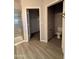 Bathroom view displaying tile floors, shower, toilet room and door into the walk-in closet at 1743 W Pollack St, Phoenix, AZ 85041