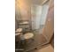 View of a bathroom featuring a glass enclosed shower, a white granite vanity, and handicap railing at 1743 W Pollack St, Phoenix, AZ 85041