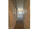 Hallway with gray walls and carpet, leading into a bedroom at 1743 W Pollack St, Phoenix, AZ 85041