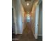 Hallway with gray walls and carpet leading into the home at 1743 W Pollack St, Phoenix, AZ 85041