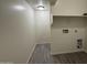 Neat laundry room featuring tile floors, neutral walls, and available hookups at 1743 W Pollack St, Phoenix, AZ 85041