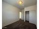 Bedroom features plush carpeting, a window for natural light and a built-in closet for convenience at 1745 W Pollack St, Phoenix, AZ 85041