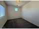 A light and bright bedroom with neutral colored walls and carpeting at 1745 W Pollack St, Phoenix, AZ 85041