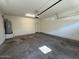 Garage with water heater, storage capabilities, and door access to other parts of the house at 1745 W Pollack St, Phoenix, AZ 85041