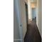 Hallway with neutral carpeting and bright white trim and walls at 1745 W Pollack St, Phoenix, AZ 85041