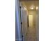 Hallway with neutral paint, tile floors, and access to other rooms in the house at 1745 W Pollack St, Phoenix, AZ 85041