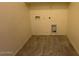 Utility closet with tile floors and washer and dryer hookups at 1745 W Pollack St, Phoenix, AZ 85041