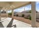 Back porch featuring a large outdoor patio with an abundance of desert landscaping at 17813 W Primrose Ln, Surprise, AZ 85374