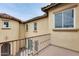 Exterior view from the balcony overlooking the other buildings in the community at 18256 W Carol Ave, Waddell, AZ 85355