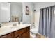 Bathroom with shower and vanity with sink at 18256 W Carol Ave, Waddell, AZ 85355