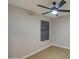 The room features neutral walls, wood floors, baseboards and a window at 18359 N 88Th Ave, Peoria, AZ 85382