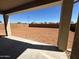 Large backyard with a covered patio perfect for entertaining at 18783 N Avelino Dr, Maricopa, AZ 85138