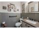 Stylish half-bathroom features subway tile and modern fixtures at 1899 E Everglade Ln, Gilbert, AZ 85298