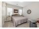 Bedroom features neutral walls, plush carpet, and plantation shutters at 1899 E Everglade Ln, Gilbert, AZ 85298