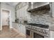 Modern kitchen features stainless steel appliances, gray cabinetry and decorative tile backsplash at 1899 E Everglade Ln, Gilbert, AZ 85298