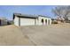 View of a home's front exterior, featuring a garage and low-maintenance landscaping at 19236 N 22Nd Ln, Phoenix, AZ 85027