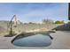 Inviting pool with rock waterfall feature in a private backyard setting at 19236 N 22Nd Ln, Phoenix, AZ 85027