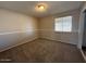 Spacious bedroom with neutral walls and large window at 1954 W Kerry Ln, Phoenix, AZ 85027