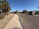 A view of the street, showing a quiet residential neighborhood at 1954 W Kerry Ln, Phoenix, AZ 85027