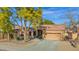 Charming single-story home with mature landscaping and a two-car garage at 2029 N 109Th Ave, Avondale, AZ 85392