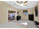 Large main bedroom boasts a seating area and coordinated dark wood bedroom set at 2029 N 109Th Ave, Avondale, AZ 85392