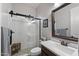 Modern bathroom featuring a glass-enclosed shower, vanity, and stylish fixtures at 2046 N Red Clf, Mesa, AZ 85207